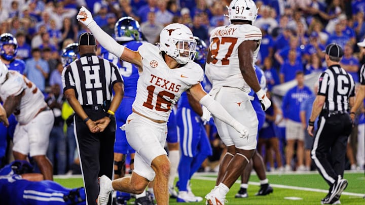 Texas Longhorns defensive back Michael Taaffe celebrates after the Kentucky Wildcats fail to score during overtime at Kroger Field.
