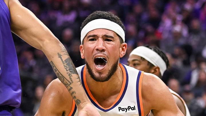 Nov 26, 2025; Sacramento, California, USA; Phoenix Suns guard Devin Booker (1) reacts to a call during the second quarter of the game against the Sacramento Kings at Golden 1 Center. Mandatory Credit: Ed Szczepanski-Imagn Images