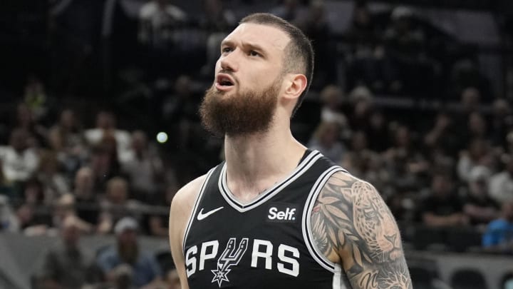 Apr 12, 2024; San Antonio, Texas, USA; San Antonio Spurs forward Sandro Mamukelashvili (54) reacts during the first half against the Denver Nuggets at Frost Bank Center. 