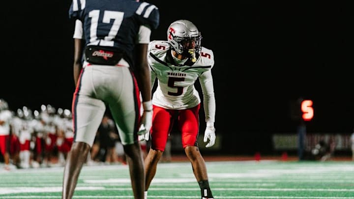 2027 defensive back Junior James (5) lines up in front of a wideout from Hewitt-Trussville (Trussville, AL) 2027 defensive back Junior James (5) lines up in front of a wideout from Hewitt-Trussville (Trussville, AL)