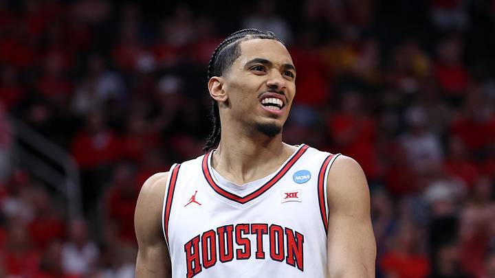 Mar 26, 2026; Houston, TX, USA; Houston Cougars guard Milos Uzan (7) reacts in the first half during a Sweet Sixteen game of the South Regional of the men's 2026 NCAA Tournament at Toyota Center. Mar 26, 2026; Houston, TX, USA; Houston Cougars guard Milos Uzan (7) reacts in the first half during a Sweet Sixteen game of the South Regional of the men's 2026 NCAA Tournament at Toyota Center.