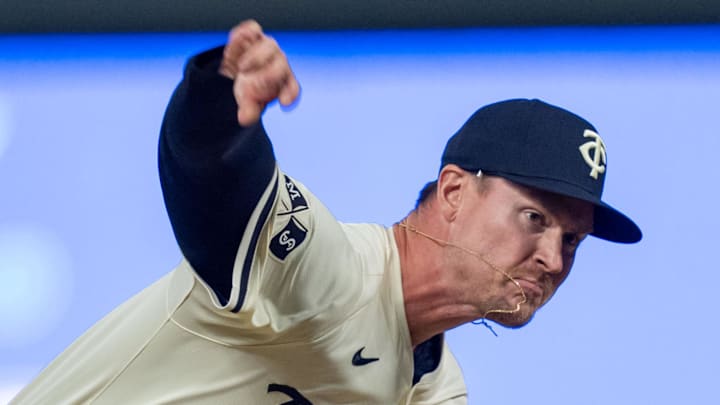 Sep 26, 2024; Minneapolis, Minnesota, USA; Minnesota Twins pitcher Scott Blewett (60) pitches in the twelfth inning against the Miami Marlins at Target Field.