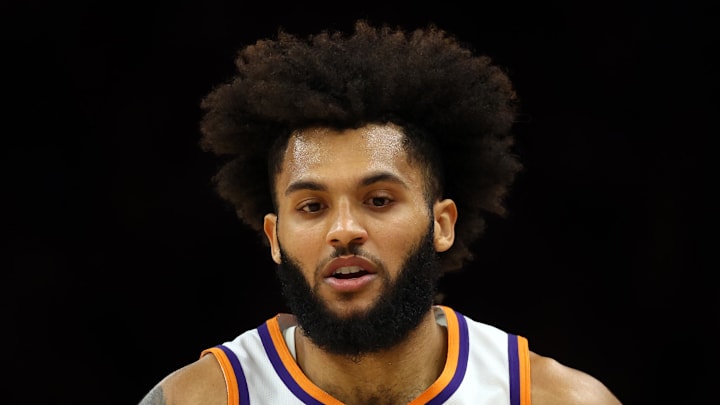 Nov 24, 2025; Phoenix, Arizona, USA; Phoenix Suns forward Isaiah Livers (18) against the Houston Rockets at Mortgage Matchup Center. Mandatory Credit: Mark J. Rebilas-Imagn Images