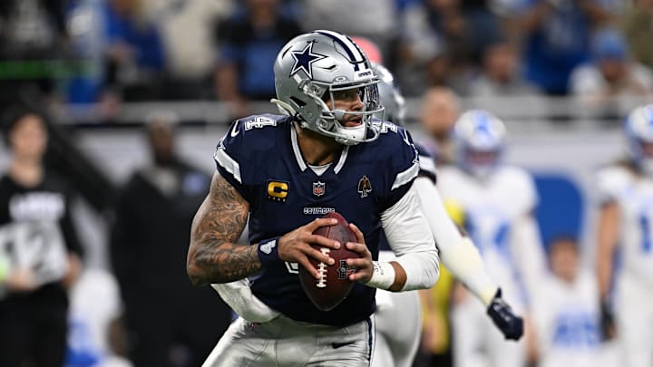 Dallas Cowboys quarterback Dak Prescott rolls out during the first half against the Detroit Lions at Ford Field. Dallas Cowboys quarterback Dak Prescott rolls out during the first half against the Detroit Lions at Ford Field.