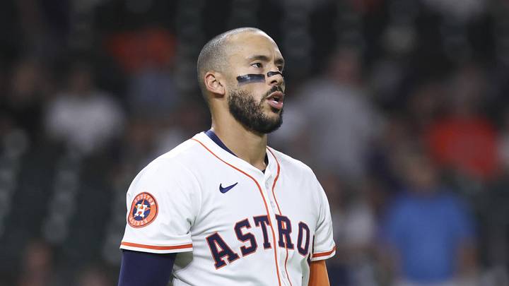 Houston Astros third baseman Carlos Correa (1) reacts
