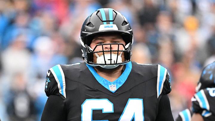 Dec 21, 2025; Charlotte, North Carolina, USA; Carolina Panthers center Cade Mays (64) runs on to the field before the game at Bank of America Stadium. Mandatory Credit: Bob Donnan-Imagn Images Dec 21, 2025; Charlotte, North Carolina, USA; Carolina Panthers center Cade Mays (64) runs on to the field before the game at Bank of America Stadium. Mandatory Credit: Bob Donnan-Imagn Images
