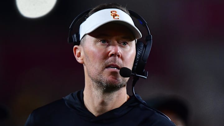 Nov 7, 2025; Los Angeles, California, USA; Southern California Trojans head coach Lincoln Riley watches game action against the Northwestern Wildcats during the second half at the Los Angeles Memorial Coliseum. Mandatory Credit: Gary A. Vasquez-Imagn Images
