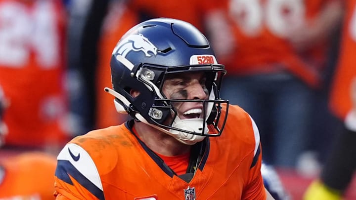 Oct 19, 2025; Denver, Colorado, USA; Denver Broncos quarterback Bo Nix (10) celebrates after play during the second half against the New York Giants at Empower Field at Mile High. Mandatory Credit: Ron Chenoy-Imagn Images