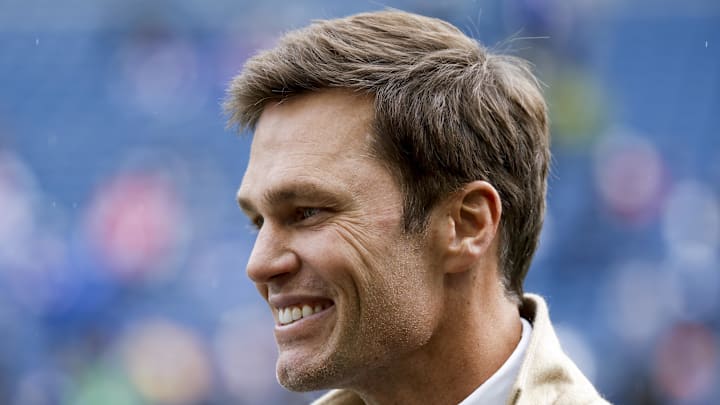 Oct 27, 2024; Seattle, Washington, USA; FOX commentator Tom Brady stands on the sideline before a game between the Seattle Seahawks and Buffalo Bills at Lumen Field. Mandatory Credit: Joe Nicholson-Imagn Images