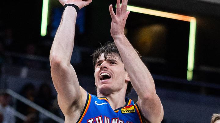 Oct 11, 2025; Indianapolis, Indiana, USA; Oklahoma City Thunder guard Brooks Barnhizer (23) shoots the ball while Indiana Pacers guard Johnny Furphy (12) defends in the second half at Gainbridge Fieldhouse. Mandatory Credit: Trevor Ruszkowski-Imagn Images Oct 11, 2025; Indianapolis, Indiana, USA; Oklahoma City Thunder guard Brooks Barnhizer (23) shoots the ball while Indiana Pacers guard Johnny Furphy (12) defends in the second half at Gainbridge Fieldhouse. Mandatory Credit: Trevor Ruszkowski-Imagn Images