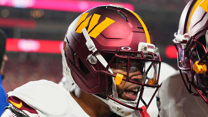 Oct 27, 2025; Kansas City, Missouri, USA; Washington Commanders cornerback Marshon Lattimore (2) celebrates an interception against the Kansas City Chiefs during the first quarter of the game at GEHA Field at Arrowhead Stadium. Mandatory Credit: Jay Biggerstaff-Imagn Images