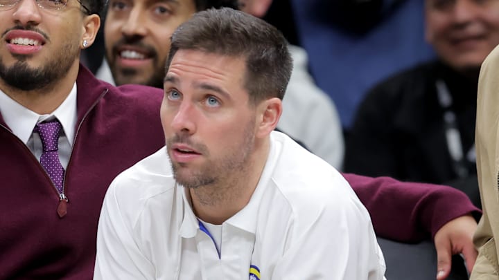 Feb 11, 2026; Brooklyn, New York, USA; Indiana Pacers guard Tyrese Haliburton (left to right) and guard T.J. McConnell (9) and forward Obi Toppin (1) watch from the bench during the second quarter against the Brooklyn Nets at Barclays Center. Mandatory Credit: Brad Penner-Imagn Images
