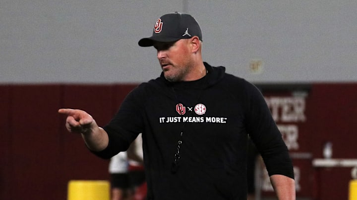 Oklahoma tight ends coach Jason Witten directs a drill during a spring practice.