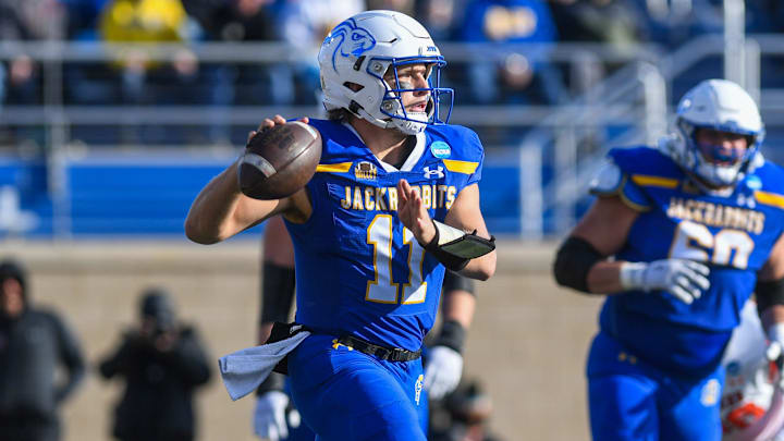 SDSU's quarterback Mark Gronowski (11) runs with the ball during a game against Mercer University on Saturday, Dec. 2, 2023, at Dana J Dykhouse Stadium in Brookings.