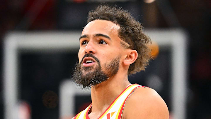 Trae Young #11 of the Atlanta Hawks reacts versus the Cleveland Cavaliers.