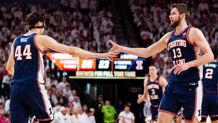 Illinois Fighting Illini centers Tomislav Ivisic (13) and Zvonimir Ivisic (44) celebrate against the Nebraska Cornhuskers at Pinnacle Bank Arena. 