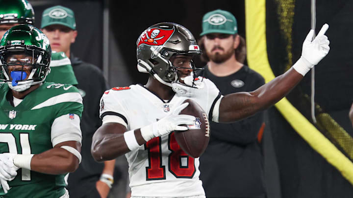 Aug 19, 2023; East Rutherford, New Jersey, USA; Tampa Bay Buccaneers wide receiver Rakim Jarrett (18) reacts after a first down in front of New York Jets safety Ashtyn Davis (21) during the second half at MetLife Stadium. Mandatory Credit: Vincent Carchietta-USA TODAY Sports
Aug 19, 2023; East Rutherford, New Jersey, USA; Tampa Bay Buccaneers wide receiver Rakim Jarrett (18) reacts after a first down in front of New York Jets safety Ashtyn Davis (21) during the second half at MetLife Stadium. Mandatory Credit: Vincent Carchietta-USA TODAY Sports