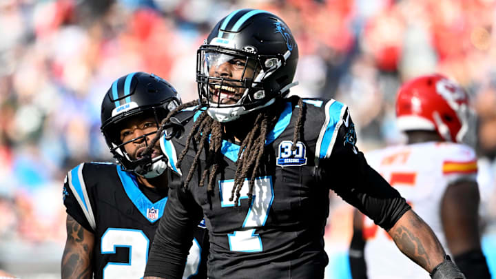 Nov 24, 2024; Charlotte, North Carolina, USA; Carolina Panthers linebacker Jadeveon Clowney (7) reacts after making a sack in the second quarter at Bank of America Stadium. Mandatory Credit: Bob Donnan-Imagn Images