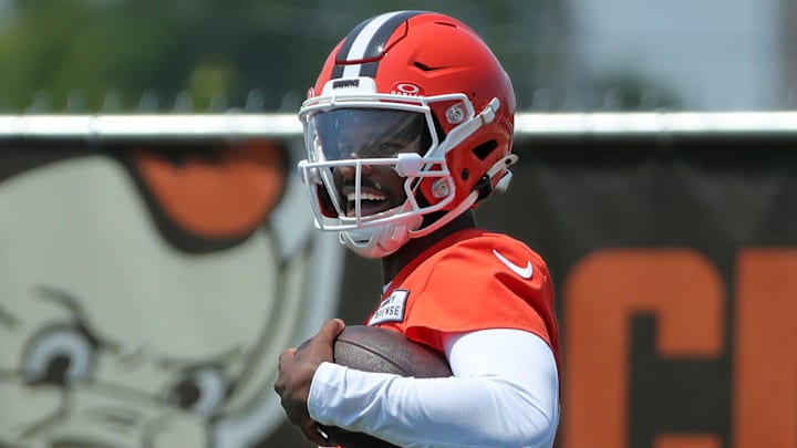 Cleveland Browns quarterback Shedeur Sanders celebrates after breaking away for a big gain during practice.