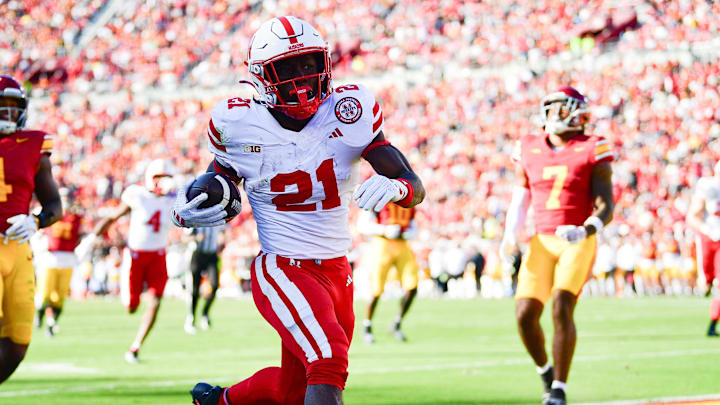 Nov 16, 2024; Nebraska running back Emmett Johnson scores a touchdown against the Southern California Trojans.