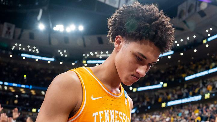 Tennessee forward Nate Ament (10) walks off the court as Michigan players celebrate their Final Four berth behind him after a NCAA Tournament Elite 8 game between Tennessee and Michigan at the United Center in Chicago on March 29, 2026. Tennessee forward Nate Ament (10) walks off the court as Michigan players celebrate their Final Four berth behind him after a NCAA Tournament Elite 8 game between Tennessee and Michigan at the United Center in Chicago on March 29, 2026.