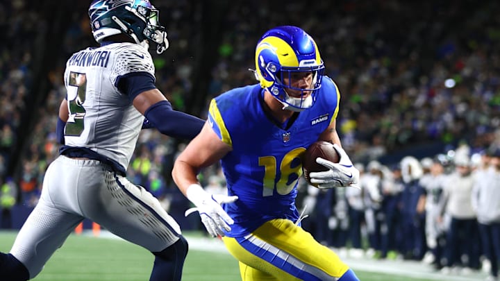 Dec 18, 2025; Seattle, Washington, USA; Los Angeles Rams tight end Terrance Ferguson (18) runs to score a touchdown against Seattle Seahawks safety Nick Emmanwori (3) in the first half at Lumen Field. Mandatory Credit: Kevin Ng-Imagn Images