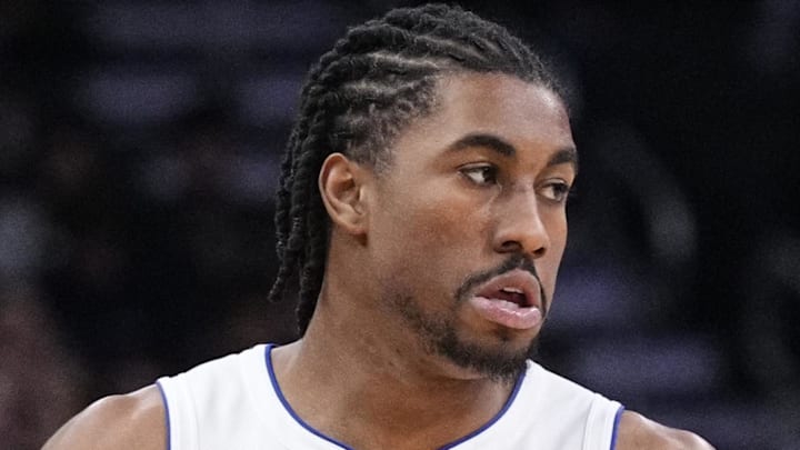 Detroit Pistons guard Jaden Ivey (23) brings the ball up the court against the Milwaukee Bucks in the second half at Fiserv Forum. on Dec 3, 2025.
