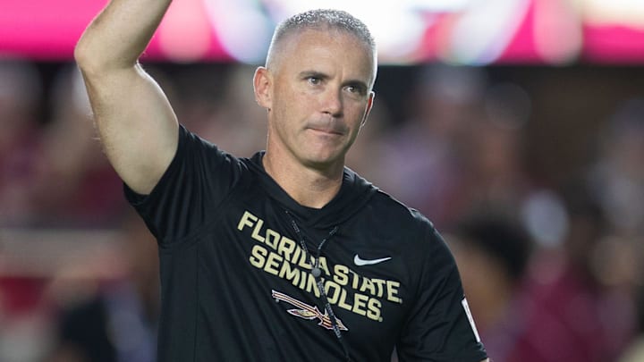 Florida State Seminoles head coach Mike Norvell walks down the field. The Miami Hurricanes lead the Florida State Seminoles 14-3 at the half on Saturday, Oct. 4, 2025. Florida State Seminoles head coach Mike Norvell walks down the field. The Miami Hurricanes lead the Florida State Seminoles 14-3 at the half on Saturday, Oct. 4, 2025.