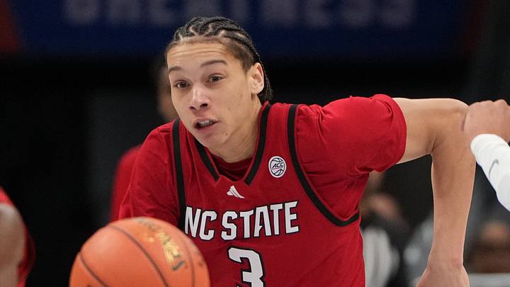 Mar 12, 2026; Charlotte, NC, USA; NC State Wolfpack guard Matt Able (3) and Virginia Cavaliers forward Devin Tillis (11) fight for the ball in the first half at Spectrum Center. Mandatory Credit: Bob Donnan-Imagn Images Mar 12, 2026; Charlotte, NC, USA; NC State Wolfpack guard Matt Able (3) and Virginia Cavaliers forward Devin Tillis (11) fight for the ball in the first half at Spectrum Center. Mandatory Credit: Bob Donnan-Imagn Images