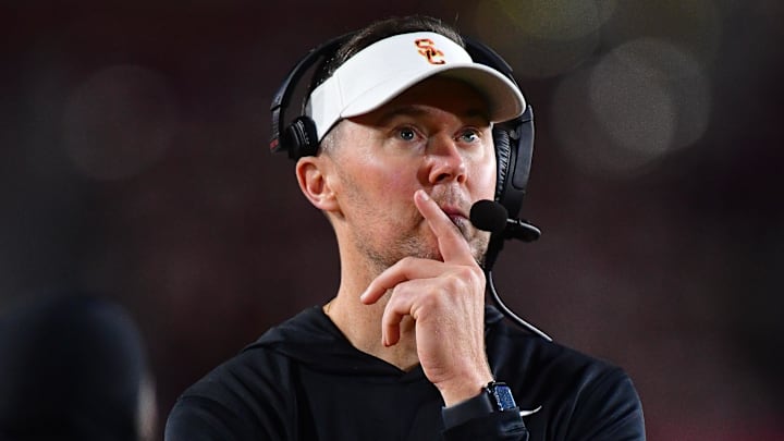 Nov 7, 2025; Los Angeles, California, USA; Southern California Trojans head coach Lincoln Riley watches game action against the Northwestern Wildcats during the second half at the Los Angeles Memorial Coliseum. Mandatory Credit: Gary A. Vasquez-Imagn Images