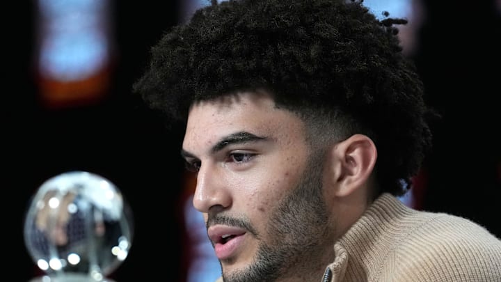 Apr 4, 2026; Indianapolis, IN, USA; Duke Blue Devils forward Cameron Boozer is awarded the Oscar Robertson Player of the Year Award presented by the US Basketball Writers Association and the Associated Press during the men's 2026 NCAA Tournament at Lucas Oil Stadium. Mandatory Credit: Bob Donnan-Imagn Images