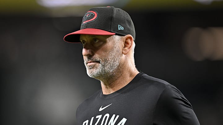 Aug 11, 2025; Arlington, Texas, USA; Arizona Diamondbacks manager Torey Lovullo (17) walks back to the dugout during the sixth inning against the Texas Rangers at Globe Life Field. Mandatory Credit: Jerome Miron-Imagn Images