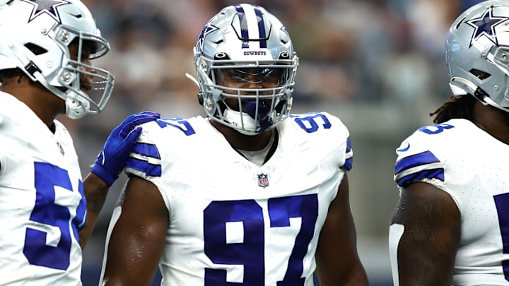 Aug 12, 2023; Arlington, Texas, USA;Dallas Cowboys defensive tackle Osa Odighizuwa (97) and defensive tackle Mazi Smith (58) on the field in the game against the Jacksonville Jaguars at AT&T Stadium. Mandatory Credit: Tim Heitman-Imagn Images Aug 12, 2023; Arlington, Texas, USA;Dallas Cowboys defensive tackle Osa Odighizuwa (97) and defensive tackle Mazi Smith (58) on the field in the game against the Jacksonville Jaguars at AT&T Stadium. Mandatory Credit: Tim Heitman-Imagn Images