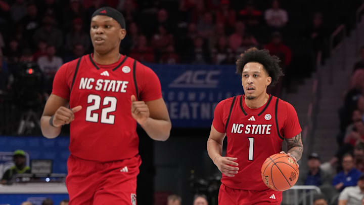 Mar 12, 2026; Charlotte, NC, USA; NC State Wolfpack forward Darrion Williams (1) brings the ball up the court in the first half at Spectrum Center. Mandatory Credit: Bob Donnan-Imagn Images Mar 12, 2026; Charlotte, NC, USA; NC State Wolfpack forward Darrion Williams (1) brings the ball up the court in the first half at Spectrum Center. Mandatory Credit: Bob Donnan-Imagn Images