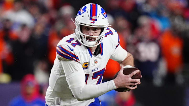 Buffalo Bills quarterback Josh Allen (17) runs during the fourth quarter of an AFC Divisional Round playoff game against the Denver Broncos at Empower Field at Mile High.