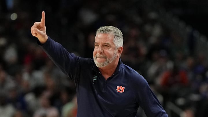 Apr 5, 2025; San Antonio, TX, USA; Auburn Tigers head coach Bruce Pearl signals to players against the Florida Gators during the first half in the semifinals of the men's Final Four of the 2025 NCAA Tournament at the Alamodome. Mandatory Credit: Bob Donnan-Imagn Images