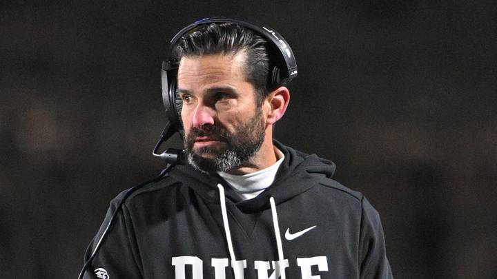 Nov 29, 2025; Durham, North Carolina, USA; Duke Blue Devils head coach Manny Diaz looks on against the Wake Forest Demon Deacons during the fourth quarter at Wallace Wade Stadium. Mandatory Credit: Zachary Taft-Imagn Images Nov 29, 2025; Durham, North Carolina, USA; Duke Blue Devils head coach Manny Diaz looks on against the Wake Forest Demon Deacons during the fourth quarter at Wallace Wade Stadium. Mandatory Credit: Zachary Taft-Imagn Images