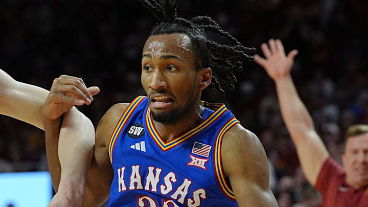 Kansas Jayhawks guard Darryn Peterson (22) drives with the ball as Iowa State Cyclones forward Dominykas Pleta (21) during the second half in the Big-12 conference basketball showdown on Feb. 14, 2026, at Hilton Coliseum, in Ames, Iowa. Kansas Jayhawks guard Darryn Peterson (22) drives with the ball as Iowa State Cyclones forward Dominykas Pleta (21) during the second half in the Big-12 conference basketball showdown on Feb. 14, 2026, at Hilton Coliseum, in Ames, Iowa.