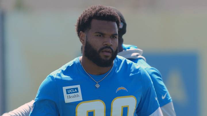 Los Angeles Chargers linebacker Akheem Mesidor; Kirby Lee