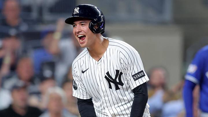 New York Yankees shortstop Anthony Volpe (11) reacts after scoring a run against the Toronto Blue Jays on a sacrifice fly by Yankees catcher J.C. Escarra (not pictured) during the fourth inning at Yankee Stadium. New York Yankees shortstop Anthony Volpe (11) reacts after scoring a run against the Toronto Blue Jays on a sacrifice fly by Yankees catcher J.C. Escarra (not pictured) during the fourth inning at Yankee Stadium.