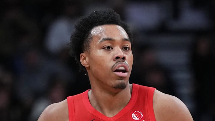 Toronto Raptors forward Scottie Barnes dribbles the ball up court against the Dallas Mavericks.