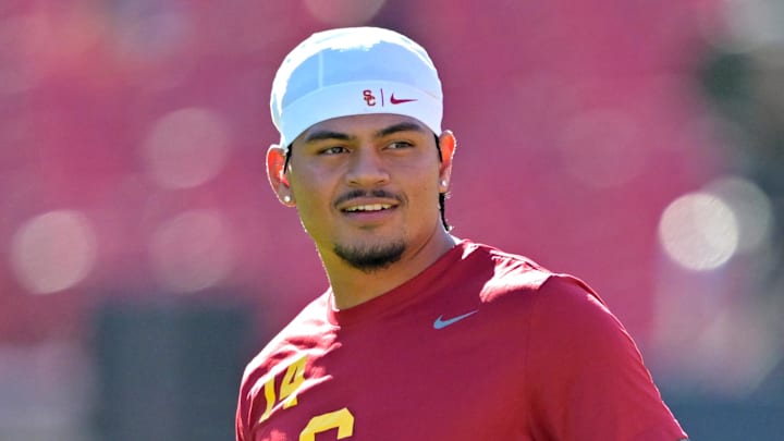 Oct 11, 2025; Los Angeles, California, USA; USC Trojans quarterback Jayden Maiava (14) warms up prior to the game against the Michigan Wolverines at United Airlines Field at the Los Angeles Memorial Coliseum. Oct 11, 2025; Los Angeles, California, USA; USC Trojans quarterback Jayden Maiava (14) warms up prior to the game against the Michigan Wolverines at United Airlines Field at the Los Angeles Memorial Coliseum.