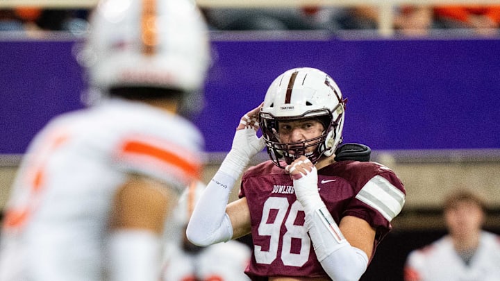 Dowling's Dylan Manning (98) looks across to the Valley offense before the snap on Friday, Nov. 15, 2024, at the UNI-Dome in Cedar Falls, IA. Dowling's Dylan Manning (98) looks across to the Valley offense before the snap on Friday, Nov. 15, 2024, at the UNI-Dome in Cedar Falls, IA.