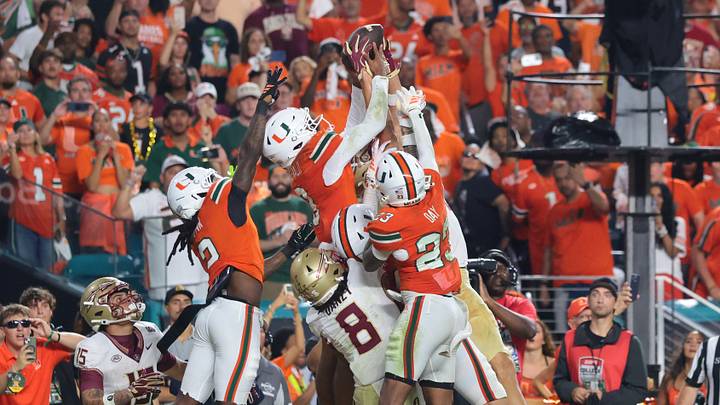 Oct 17, 2026; Miami Gardens, Florida, USA;  Miami Hurricanes defensive back Bryce Fitzgerald (3) makes an interception to end the game in overtime against the Florida State Seminoles at Hard Rock Stadium.  Mandatory Credit: Sam Navarro-Imagn Images