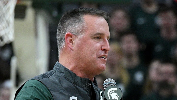 Dec 2, 2025; East Lansing, Michigan, USA;  Michigan State head football coach Pat Fitzgerald watches the Spartans defeat the Iowa Hawkeyes at Jack Breslin Student Events Center. Mandatory Credit: Dale Young-Imagn Images