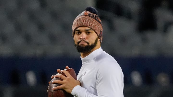 Jan 10, 2026; Chicago, IL, USA; Chicago Bears quarterback Caleb Williams (18) warms up prior to an NFC Wild Card Round game against the Green Bay Packers at Soldier Field. Mandatory Credit: David Banks-Imagn Images