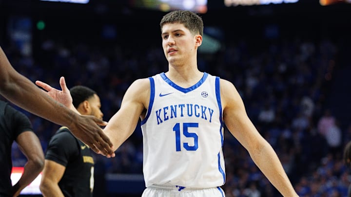 Mar 6, 2024; Lexington, Kentucky, USA; Kentucky Wildcats guard Reed Sheppard (15) fives forward Aaron Bradshaw (2) during the first half against the Vanderbilt Commodores at Rupp Arena at Central Bank Center. Mandatory Credit: Jordan Prather-USA TODAY Sports