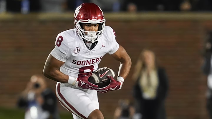 Oklahoma running back Taylor Tatum rushes the ball against Missouri.