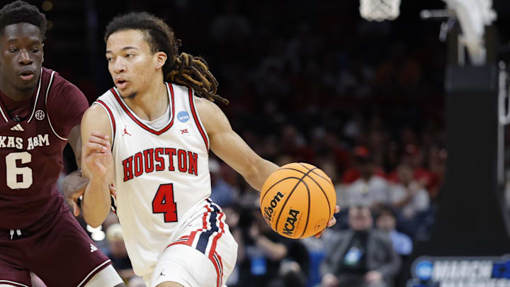 Mar 21, 2026; Oklahoma City, OK, USA; Houston Cougars guard Kingston Flemings (4) drives to the hoop past Texas A&M Aggies guard Ali Dibba (6) during the second half of a second round game of the men's 2026 NCAA Tournament at Paycom Center. Mandatory Credit: Alonzo Adams-Imagn Images
