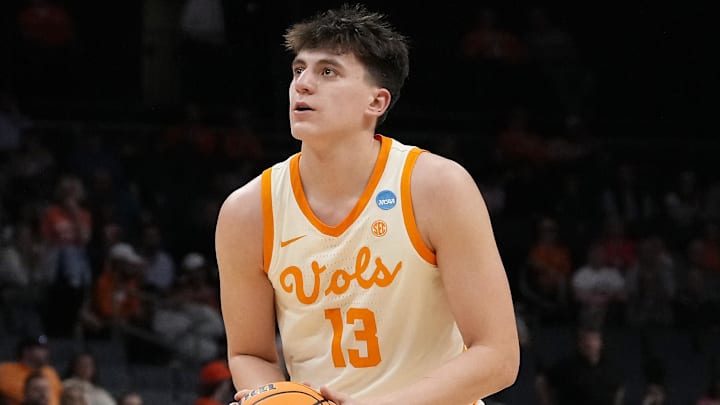 Mar 21, 2024; Charlotte, NC, USA; Tennessee Volunteers forward J.P. Estrella (13) shoots a free throw in the first round of the 2024 NCAA Tournament at Spectrum Center. Mandatory Credit: Jim Dedmon-Imagn Images Mar 21, 2024; Charlotte, NC, USA; Tennessee Volunteers forward J.P. Estrella (13) shoots a free throw in the first round of the 2024 NCAA Tournament at Spectrum Center. Mandatory Credit: Jim Dedmon-Imagn Images
